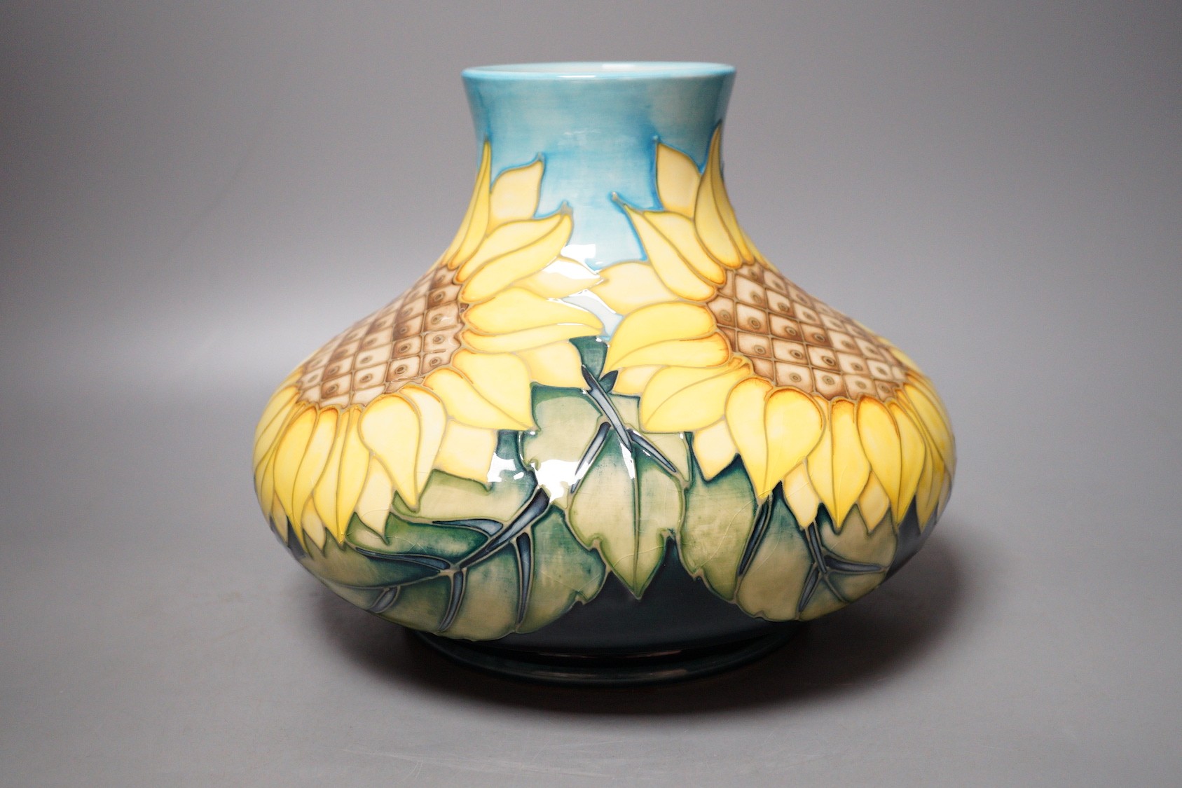 A Moorcroft pottery vase of compressed form, decorated in the 